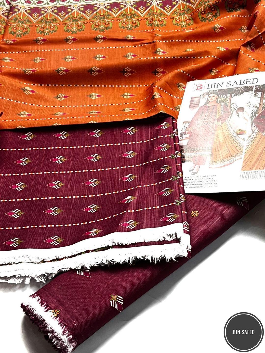 3 Pcs Women's Unstitched Khaddar Printed Suit (Rich Maroon).